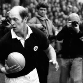 Scotland captain Mike Biggar takes to the field.