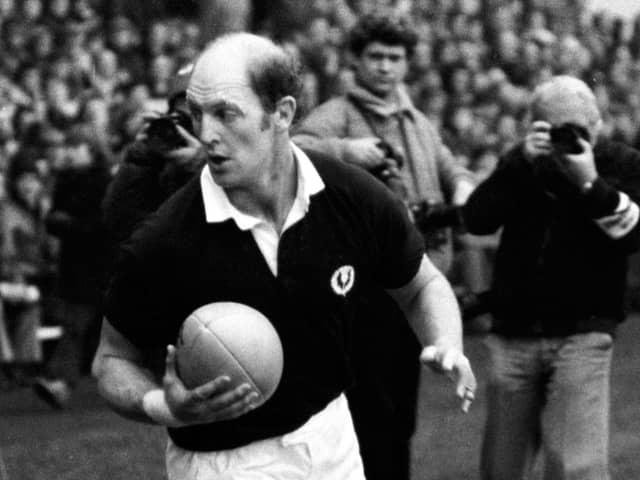 Scotland captain Mike Biggar takes to the field.