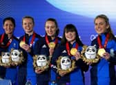 Great Britain's Eve Muirhead, Vicky Wright, Jennifer Dodds, Hailey Duff and Mili Smith celebrate with their gold medals after the Women's Gold Medal Game against Japan  (Photo: Andrew Milligan/PA Wire.)