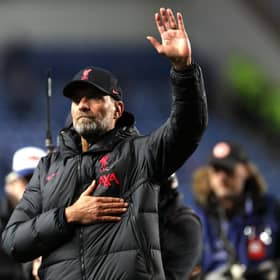 Liverpool manager Jurgen Klopp salutes the fans after defeating Rangers 7-1 at Ibrox.