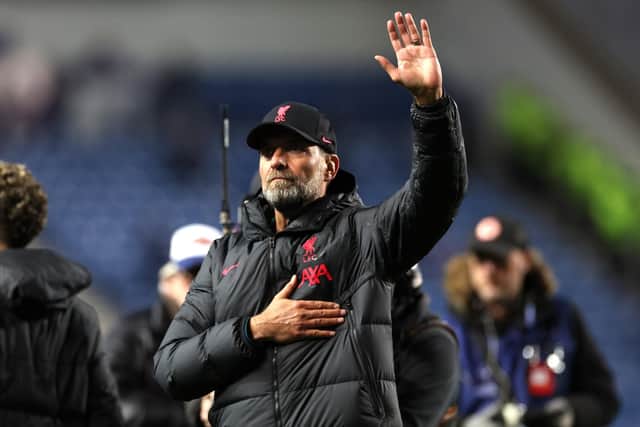 Liverpool manager Jurgen Klopp salutes the fans after defeating Rangers 7-1 at Ibrox.