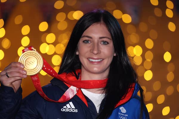 Team GB skip Eve Muirhead poses with her gold medal from the Beijing Winter Olympics. (Photo by Warren Little/Getty Images)