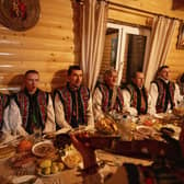 Men dressed in traditional hutsuls suits sing Kolyadky songs during Christmas celebrations in Kryvorivnia village, Ukraine. Ukraine celebrated Christmas on 25 December for the first time this year in a snub to Russia.