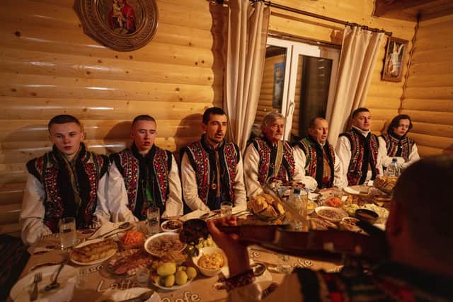 Men dressed in traditional hutsuls suits sing Kolyadky songs during Christmas celebrations in Kryvorivnia village, Ukraine. Ukraine celebrated Christmas on 25 December for the first time this year in a snub to Russia.