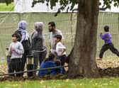 Families inside a migrant holding facility at Manston Airfield pictured earlier this month (Picture: Dan Kitwood/Getty Images)