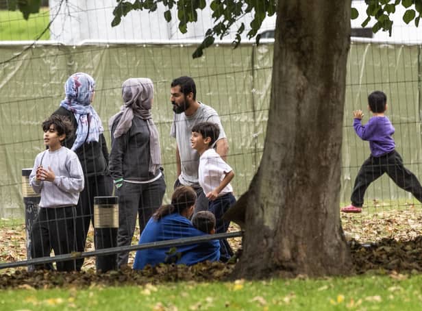 Families inside a migrant holding facility at Manston Airfield pictured earlier this month (Picture: Dan Kitwood/Getty Images)
