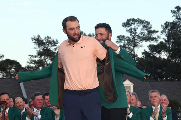 Scottie Scheffler is awarded the Green Jacket by 2023 champion Jon Rahm during the Green Jacket Ceremony at Augusta National Golf Club. Picture: Jamie Squire/Getty Images.