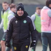 Celtic manager Brendan Rodgers braves the cold during training at Lennoxtown.