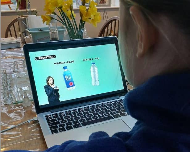 Teaching kids to save more and spend less this summer
