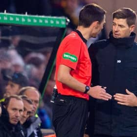 Rangers manager Steven Gerrard (right) speaks to referee Kevin Clancy
