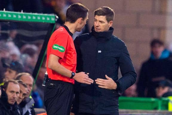 Rangers manager Steven Gerrard (right) speaks to referee Kevin Clancy