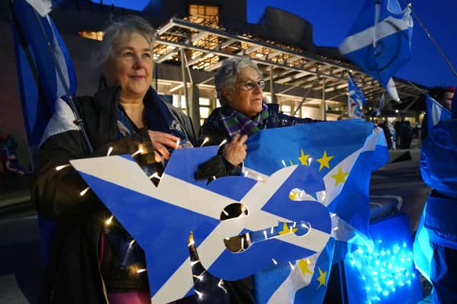 People attend a rally outside the Scottish Parliament in Edinburgh following the decision by judges at the UK Supreme Court in London that the Scottish Parliament does not have the power to hold a second independence referendum. Picture date: Wednesday November 23, 2022.