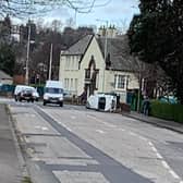 The car flipped onto its side on Balgreen Road. Pic: contributed