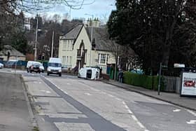 The car flipped onto its side on Balgreen Road. Pic: contributed
