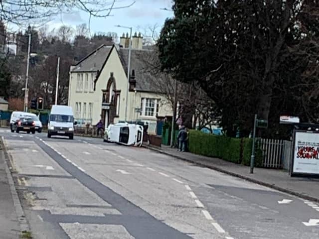 The car flipped onto its side on Balgreen Road. Pic: contributed