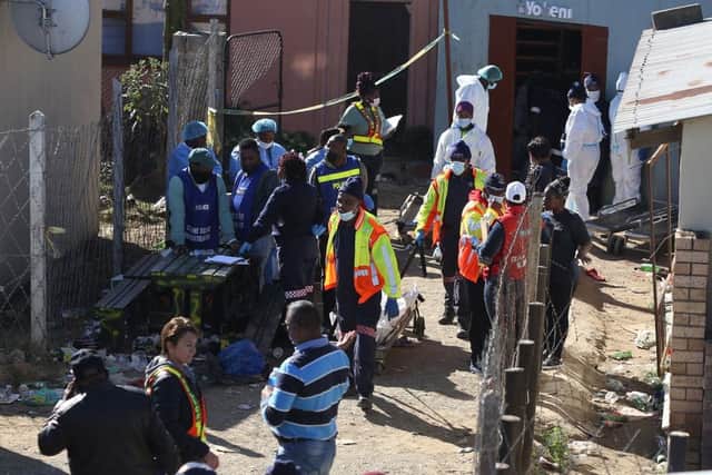 Around 22 teenagers, the youngest aged just 13, have died at a township pub in South Africa's southern city of East London, but the cause of the deaths is still unclear. Picture: AFP via Getty Images