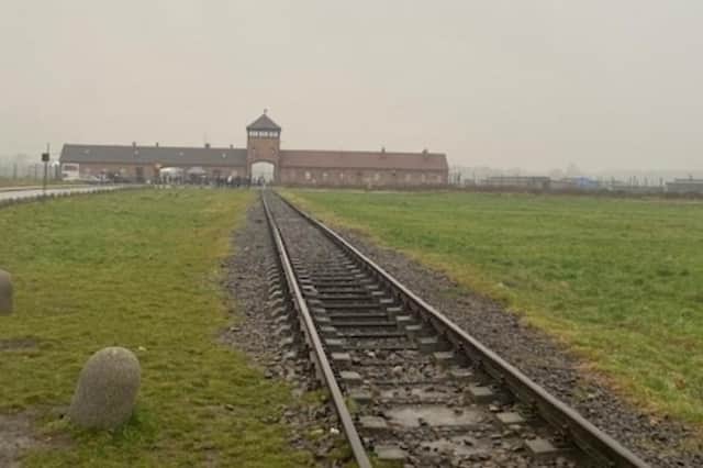 The train tracks that lead into the Auschwitz – Birkenau II camp.