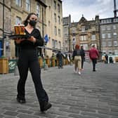 Tougher restrictions on hospitality in Scotland mean it won't be a happy Hogmanay for most pubs (Picture: Jeff J Mitchell/Getty Images)