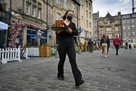 Tougher restrictions on hospitality in Scotland mean it won't be a happy Hogmanay for most pubs (Picture: Jeff J Mitchell/Getty Images)