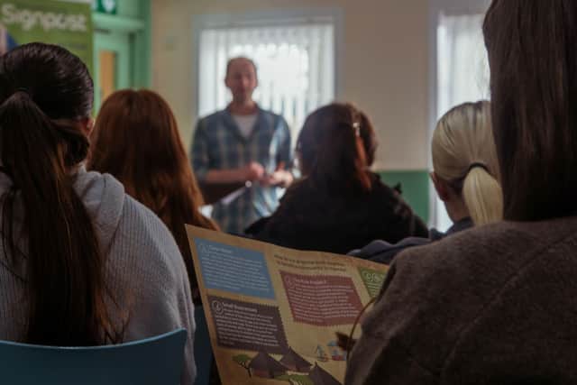Jamie Morrison of Signpost International presenting to University of Dundee students during recent visit