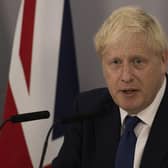 Boris Johnson has spoken to Tory 1922 Committee chairman Sir Graham Brady and agreed to stand down, with a new Tory leader set to be in place by the party conference in October, a No 10 source said.
