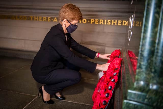 First Minister Nicola Sturgeon lays a wreath in the Crypt of the Scottish National War Memorial in Edinburgh Castle.