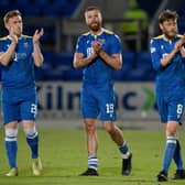 St Johnstone players applaud their fans at full time after beating Aberdeen.