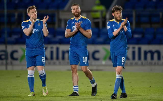 St Johnstone players applaud their fans at full time after beating Aberdeen.