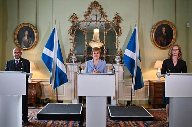 Support from the Scottish Greens, led by Patrick Harvie (left) and Lorna Slater (right), help Nicola Sturgeon hold on to emergency powers, says reader (Picture: Jeff J Mitchell/AFP/Getty Images)