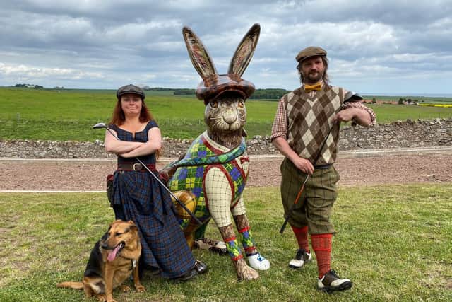Mural artist Chris Rutterford and partner Lubi Lykan with their hare