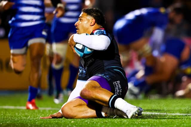 Glasgow Warriors' Sione Tuipulotu scores his side's first try of the match during the BKT URC match against DHL Stormers at Scotstoun. (Photo by Ross MacDonald / SNS Group)
