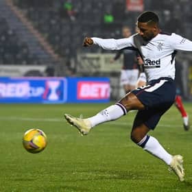 Jermain Defoe slots home in the sixth minute to open the scoring for Rangers in their Betfred Cup tie against Falkirk. (Photo by Rob Casey / SNS Group)