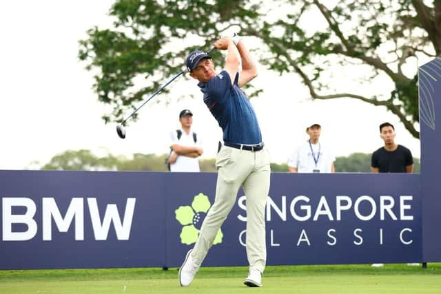 Grant Forrest tees off on the first hole in the opening round of the Singapore Classic at Laguna National Golf Resort Club. Picture: Yong Teck Lim/Getty Images.