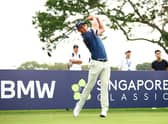 Grant Forrest tees off on the first hole in the opening round of the Singapore Classic at Laguna National Golf Resort Club. Picture: Yong Teck Lim/Getty Images.