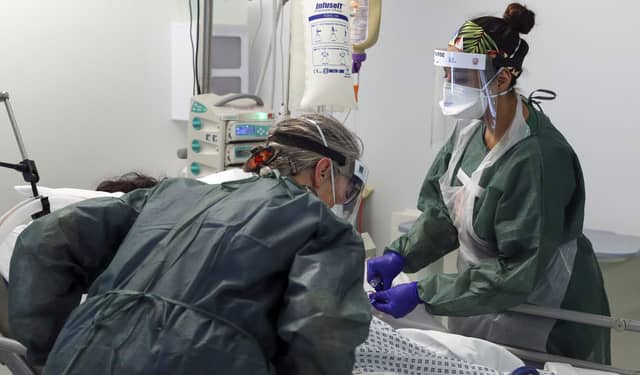 Private US healthcare firms are posed to take over parts of the NHS with help from Conservative MPs, says Professor Harry Burns (Picture: Steve Parsons/PA)