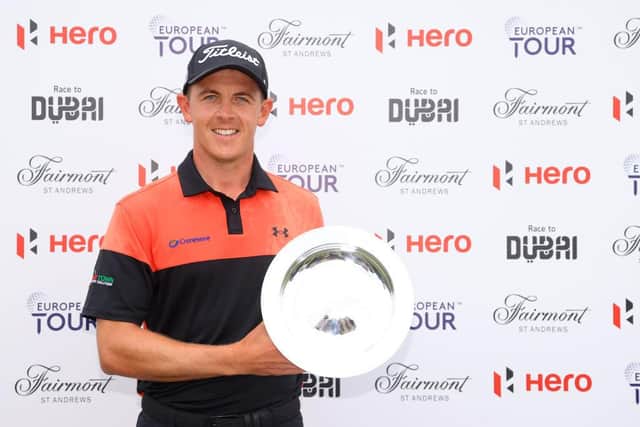 Grant Forrest of poses with the trophy after landing his breakthrough victory in the Hero Open at Fairmont St Andrews. Picture: Andrew Redington/Getty Images.
