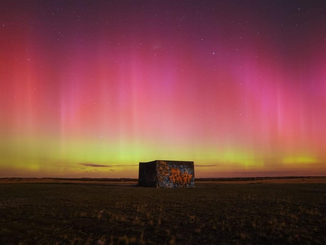 New Zealand regularly has aurora but due to its distance from the magnetic pole they are often not particularly vibrant for observers. Due to the increased solar activity the region saw this year, the photographer was able to capture a highly colourful aurora over Birdlings Flat, New Zealand.
‘A strong aurora image does not always need to display chaotic structures. Sometimes the best way to convey how it feels to witness the spectacle is to capture the serenity and peace of a celestial light display. This image fits the bill perfectly, with the strong pink and red hue over the more common green elevating it to a whole new level. Absolutely stunning!’ - Steve Marsh
Taken with a Rokinon 14mm f/2.8 telescope, Nikon Z6 (Astro modified) camera, 14 mm f/1.8, ISO 1600, 15-second exposure
Location: Birdlings Flat, Canterbury, New Zealand