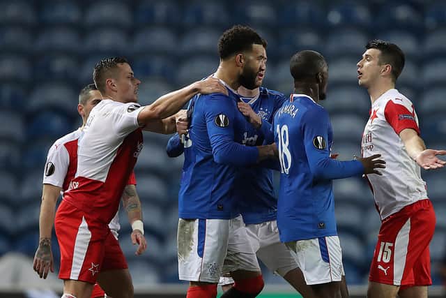 Connor Goldson and Glen Kamara of Rangers clash with Ondrej Kudela of Slavia Praha during the UEFA Europa League Round of 16 Second Leg. (Photo by Ian MacNicol/Getty Images)
