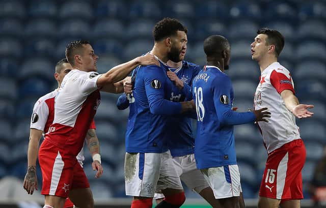 Connor Goldson and Glen Kamara of Rangers clash with Ondrej Kudela of Slavia Praha during the UEFA Europa League Round of 16 Second Leg. (Photo by Ian MacNicol/Getty Images)