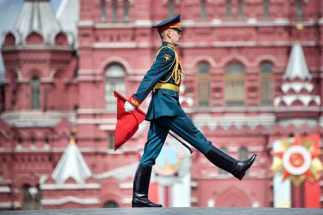 A Russian honour guard marches on Red Square during the Victory Day military parade.
