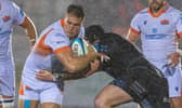 Edinburgh's Duhan van der Merwe is tackled during the defeat by Glasgow Warriors at Scotstoun.  (Photo by Ross Parker / SNS Group)