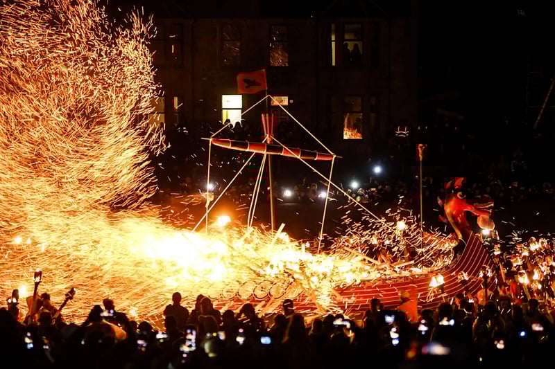The Lerwick Up Helly Aa Committee last year decided to relax the long-standing custom of only allowing males to take part in the procession after members discussed how to take the event forward following a two-year absence due to the Covid-19 pandemic.
Photo by Andy Buchanan / AFP
