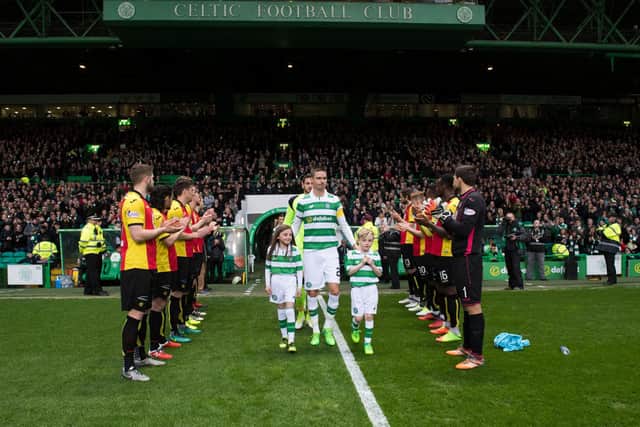 Celtic receiving a guard of honour from Partick Thistle after winning the title in 2017. Picture: SNS