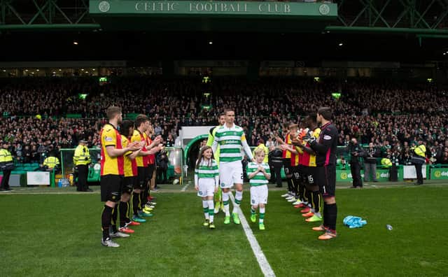 Celtic receiving a guard of honour from Partick Thistle after winning the title in 2017. Picture: SNS