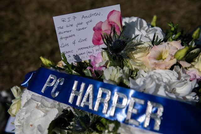 Floral tributes are left at the scene where Police Constable Andrew Harper died (Photo: Chris J Ratcliffe/Getty Images)