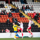 Fans watch on during the Scottish Championship play-off final first leg tie between Airdrie and Morton at Penny Cars Stadium.