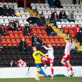 Fans watch on during the Scottish Championship play-off final first leg tie between Airdrie and Morton at Penny Cars Stadium.