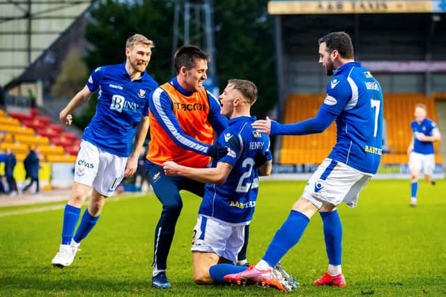 Callum Hendry celebrates with team mates after scoring the winner for St Johnstone