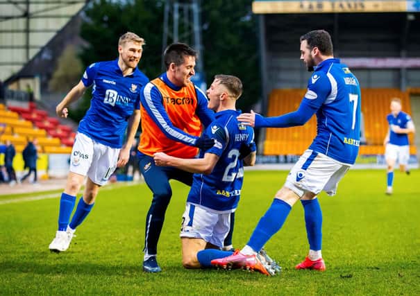Callum Hendry celebrates with team mates after scoring the winner for St Johnstone
