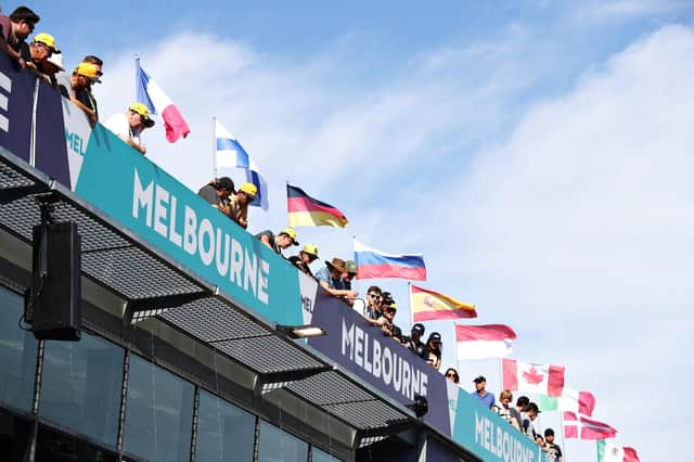 Fans watch over from above the pitlane during previews ahead of the F1 Grand Prix of Australia at Melbourne Grand Prix Circuit on March 12th, 2020. Photo: Robert Cianflone/Getty Images.